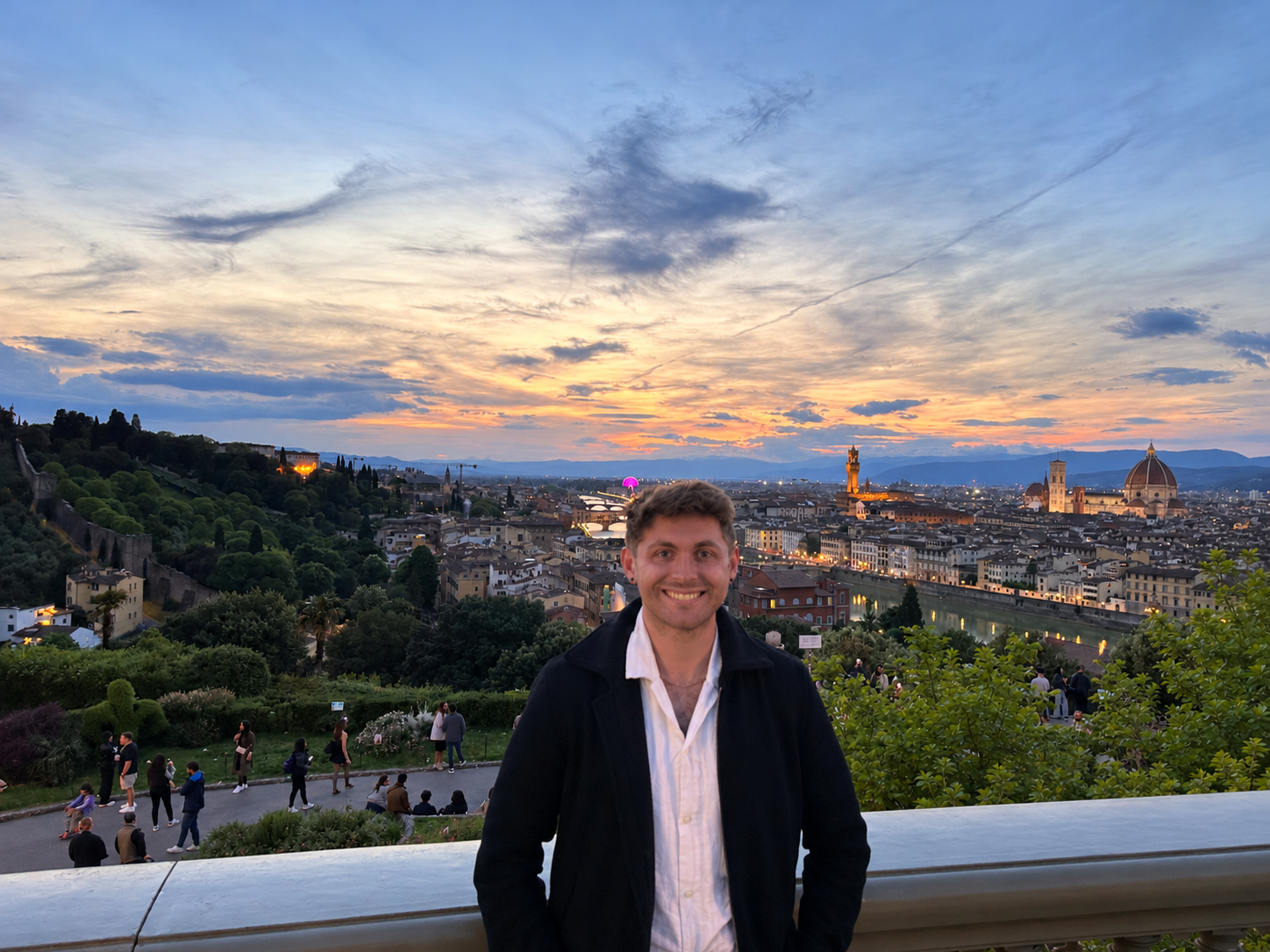 Aidan Russo overlooking Florence at sunset during his travels in Italy